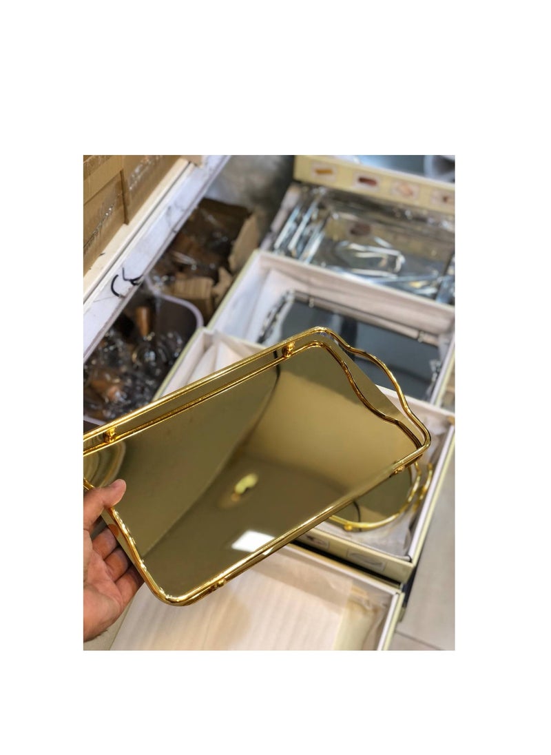 Generic - Rectangular Mirror Serving Tray Set Stainless 2-Piece Serving Tray Set Very chic for serving with a mirrored sheen. The set is made of two pieces in sizes to suit all your needs. A set of stainless steel serving trays with a mirror on the magnet, gold. - Image 1