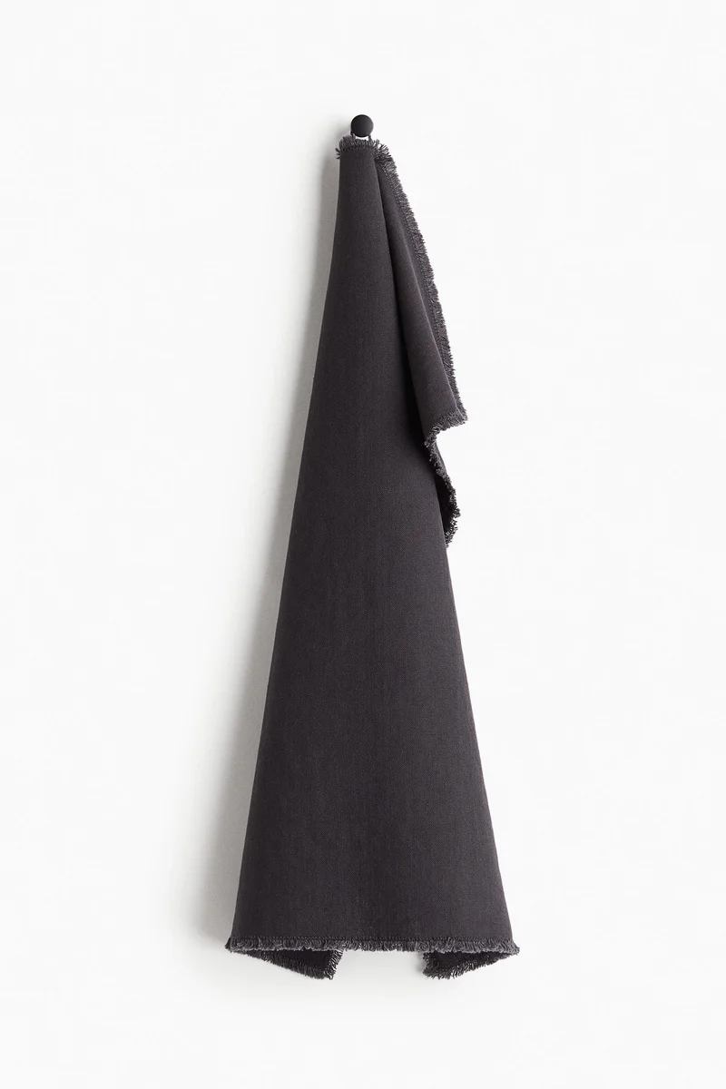 H&M Fringed linen-blend tea towel