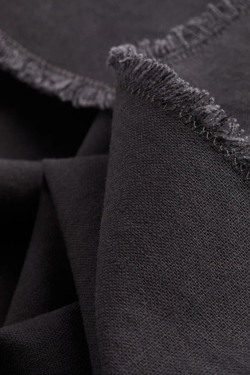 H&M Fringed linen-blend tea towel