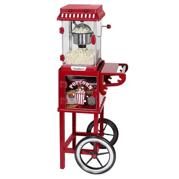 POPCORN POPPER MACHINE THEATER STYLE ON WHEELED CART WITH NONSTICK 25 OZ STAINLESS STEEL POPCORN KETTLE STORAGE SHELF AND POPCORN SCOOP 10CUP RED