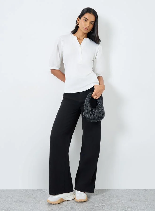 تايك تو بلوزة بأكمام منفوخة