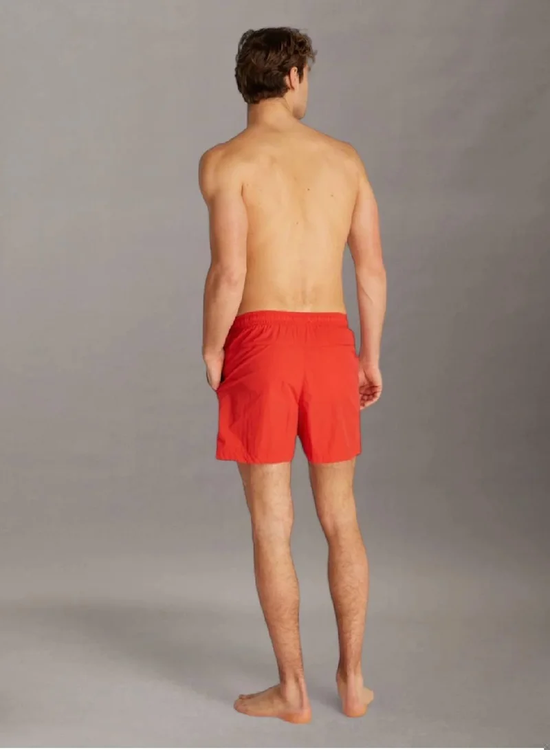 كالفن كلاين جينز شورت سباحة متوسط برباط من النايلون الناعم سي كيه