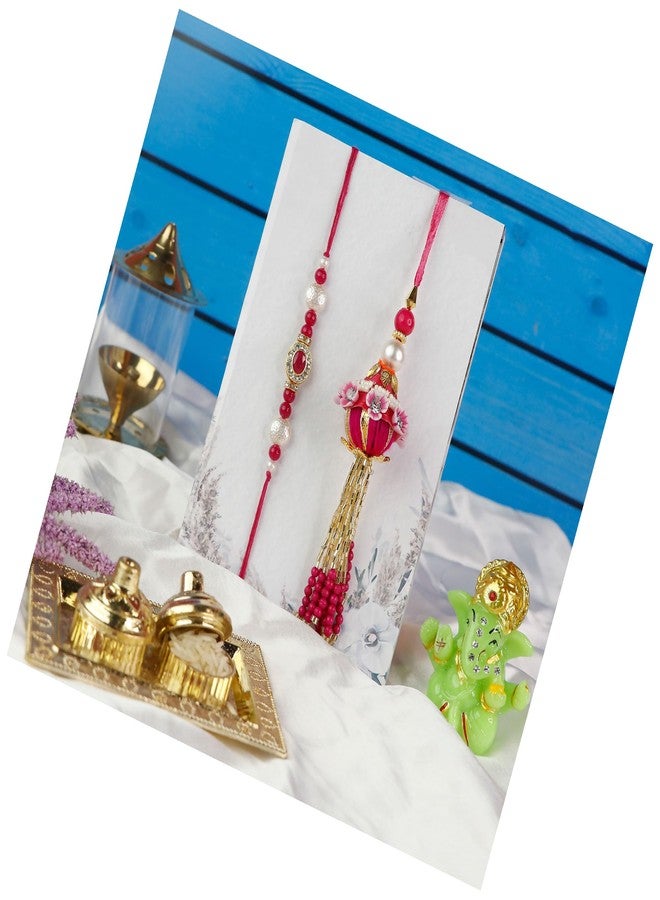 Toris Pack of 2 Rakhi Comes with Tilak set, Greeting card in Elegant Pink Shade – Thoughtful Rakhi Gift with Traditional Charm and Style - Image 1