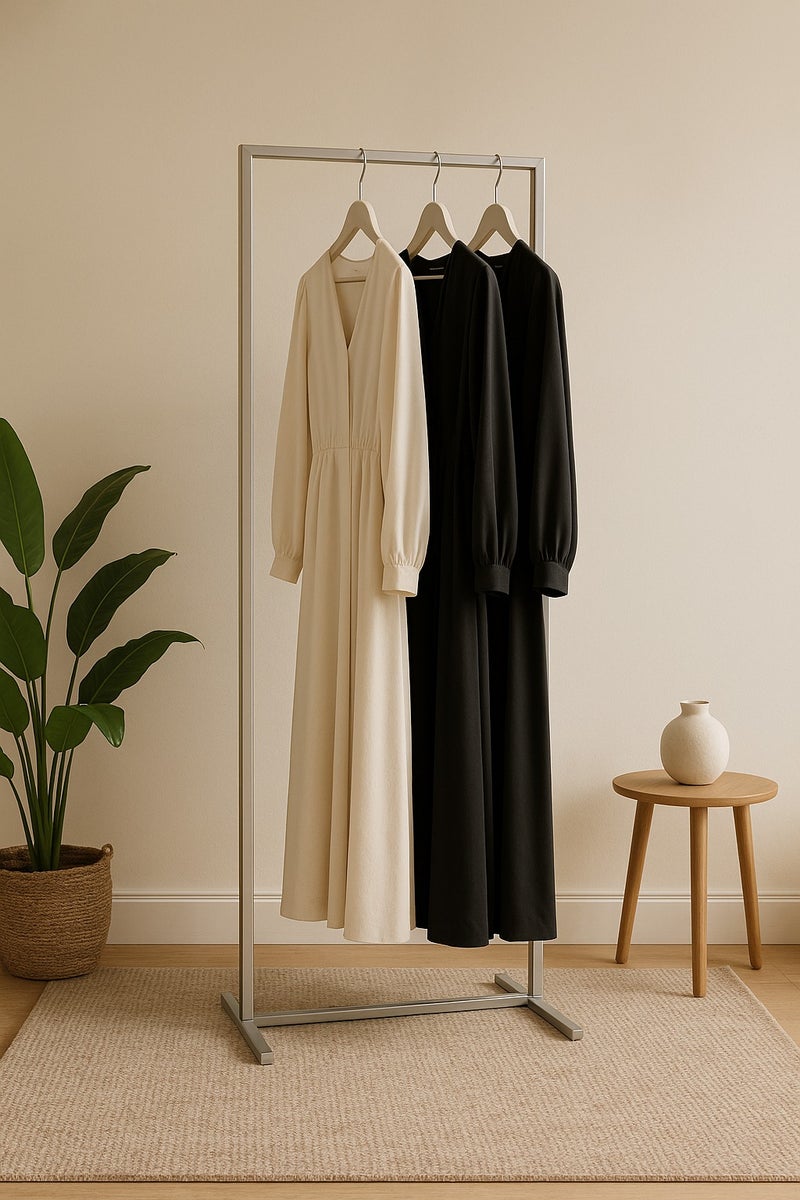 bilutih Stylish and modern metal clothes hanger with a fixed base for hanging dresses, bags and more in silver - Image 1