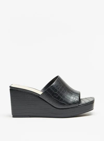 فلورا بيلا من شو إكسبرس Women's Textured Slip-On Sandals With Wedge Heels