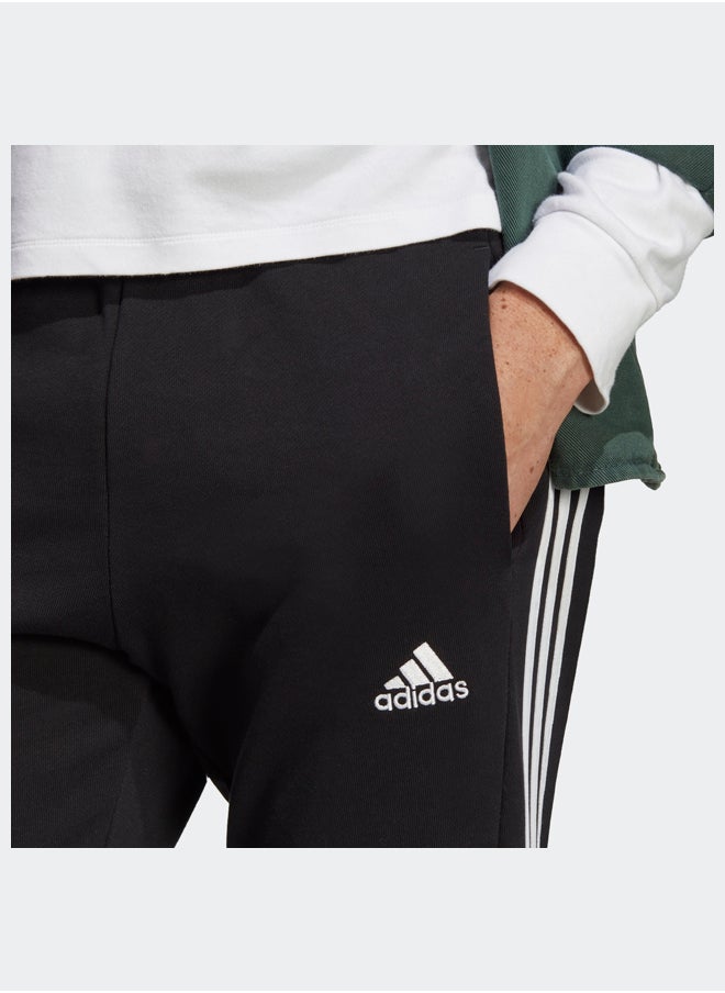 Adidas بنطال رياضي أساسيات فرينش تيري بأساور مطاطية مدببة بثلاثة خطوط  - Image 4
