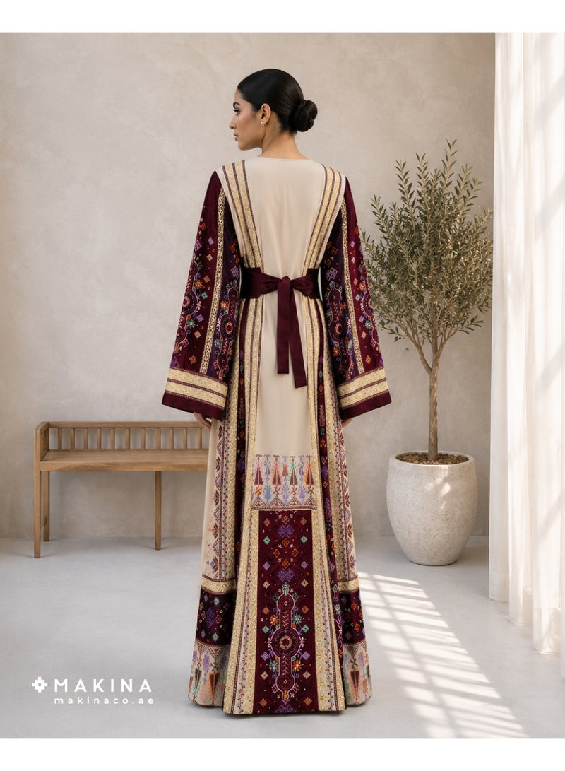 MAKINA A Half-Tallas Fallahi thobe crafted from premium Japanese Mubrad, featuring a rich fusion of Arabian embroidery patterns that reflect deep tradition and intricate artistry. This elegant garment is accented with cool satin for a subtle glow and a luxurious, silky touch. - Image 2