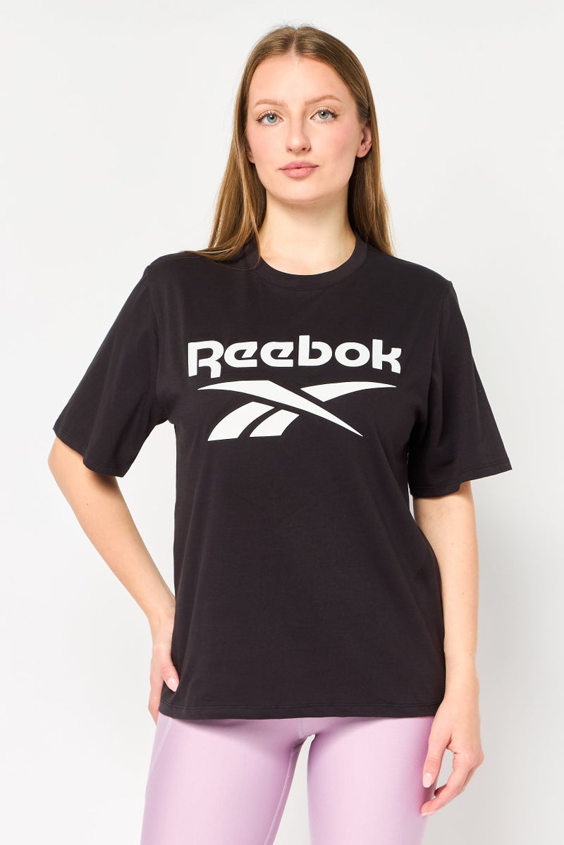 Reebok تي شيرت رياضي نسائي قصير الأكمام في الهواء الطلق، أسود - Image 1