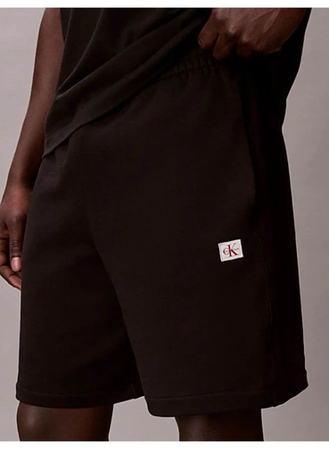 Calvin Klein Jeans Black Cotton Terry Badge Jogger Shorts for Men | Best Price UAE