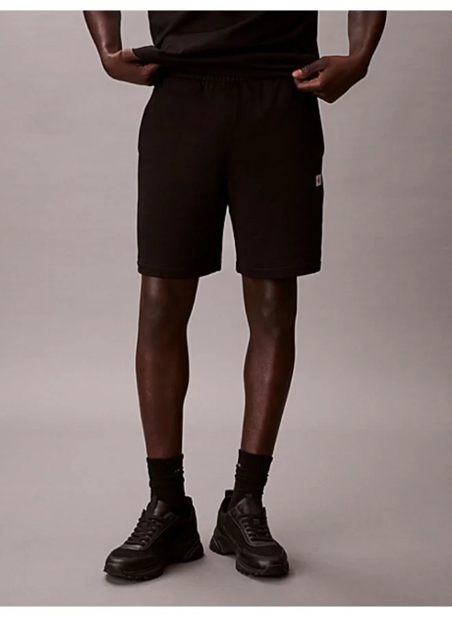 Calvin Klein Jeans Black Cotton Terry Badge Jogger Shorts for Men | Best Price UAE