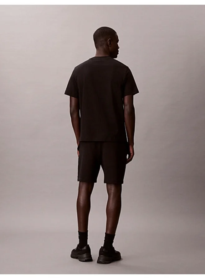 Calvin Klein Jeans Black Cotton Terry Badge Jogger Shorts for Men | Best Price UAE