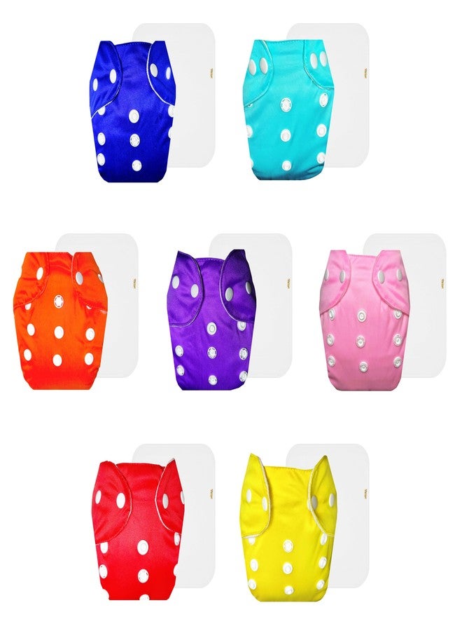 حفاضات دمبلدو لايت القماشية مع حشوة قطنية (عبوة من 7) | ملائمة تمامًا | مانعة للتسرب | أزرار كبس قابلة للتعديل | مثالية للأطفال الصغار | من 3 أشهر إلى سنتين | للجنسين - Image 1