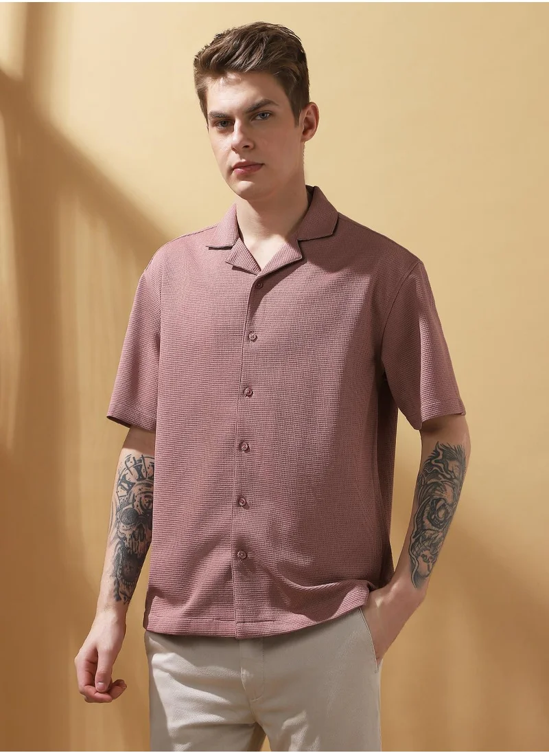 Dennis Lingo Upgrade your wardrobe with this premium Pink Relaxed fit Shirts Textured design crafted from 100% Polyester featuring Half Sleeve with Button closure.