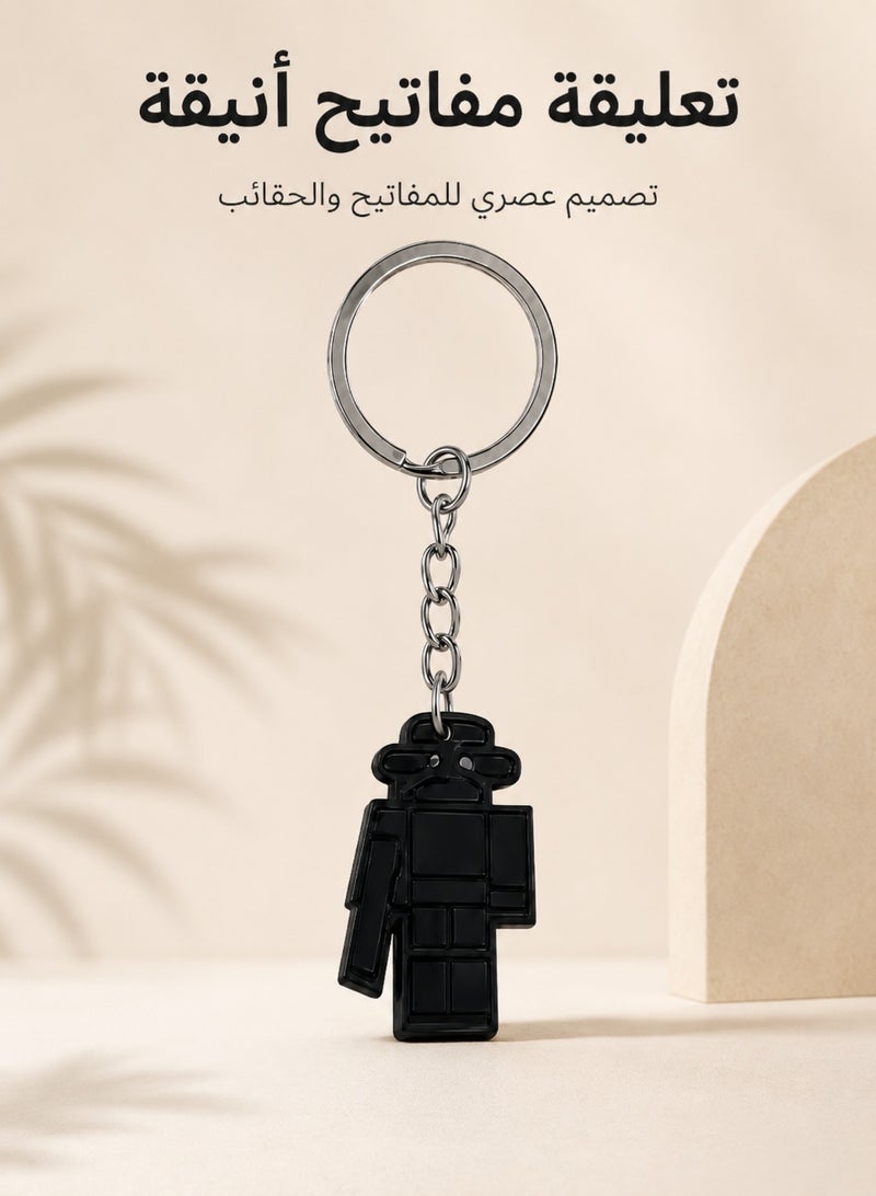 Black Cartoon Character Keychain With Metal Ring - Image 1