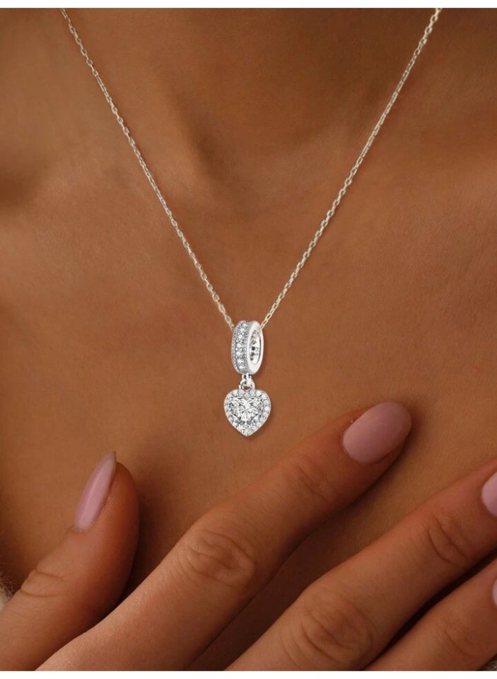 925 Sterling Silver Charms Delicate Luxurious Pendant Necklace Crafted From 925 Sterling Silver With High Quality And Precision It Features A Central Ring Studded With Tiny Crystals From Which Hangs A Heart Shaped Pendant Fully Adorned With Tiny Sparkling Crystals On The Frame In The Middle Is A Large Sparkling Heart Shaped Zircon Crystal Stone That Adds A Wonderful Visual Dimension And Reflects Light Brilliantly Giving The Princess She Deserves A Stunning Look - Image 1
