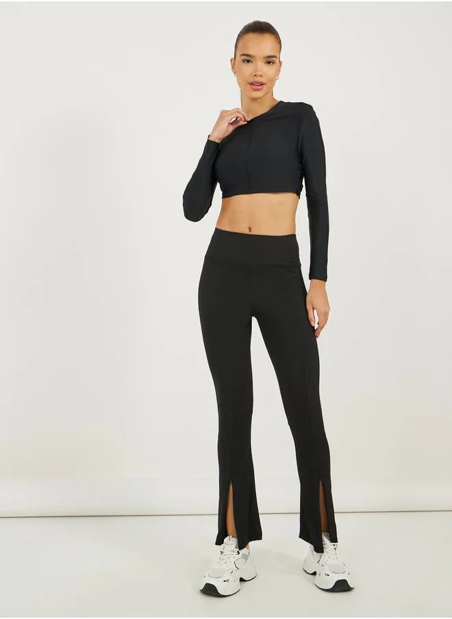 Styli Broad Waistband Ankle Zip Up Detail Flared Pants