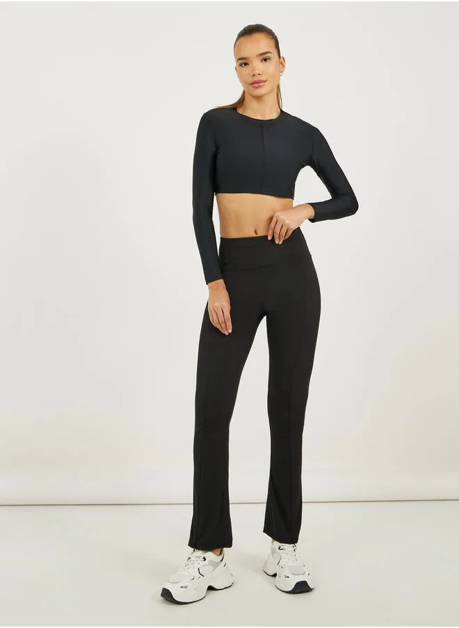 Styli Broad Waistband Ankle Zip Up Detail Flared Pants