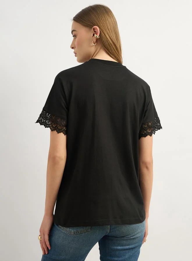 Styli Solid Round Neck Boxy Fit T-Shirt with Lace Trim Detail