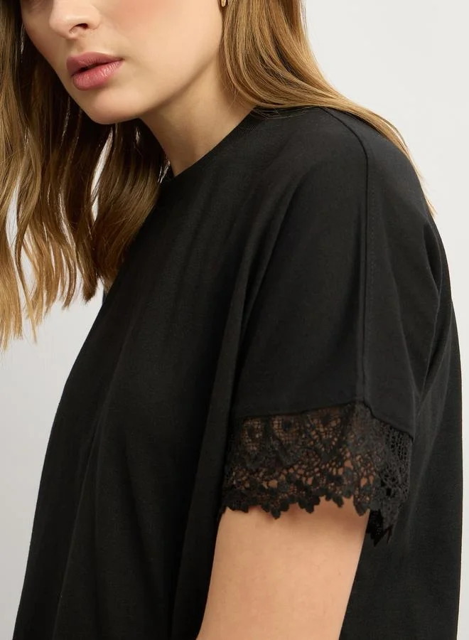 Styli Solid Round Neck Boxy Fit T-Shirt with Lace Trim Detail