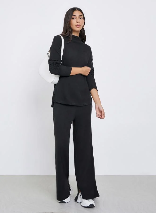 Styli Styli Black Ribbed Dropped Shoulder Knit Top with Slit