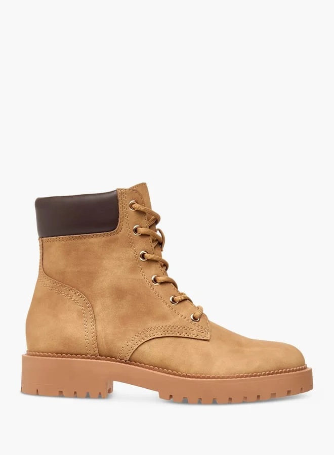 فلورا بيلا من شو إكسبرس Women's Pand Zippered Ankle Boots with Chunky Sole