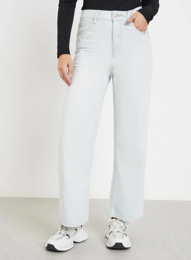 ستايلي جينز سادة بأرجل واسعة وخصر متوسط