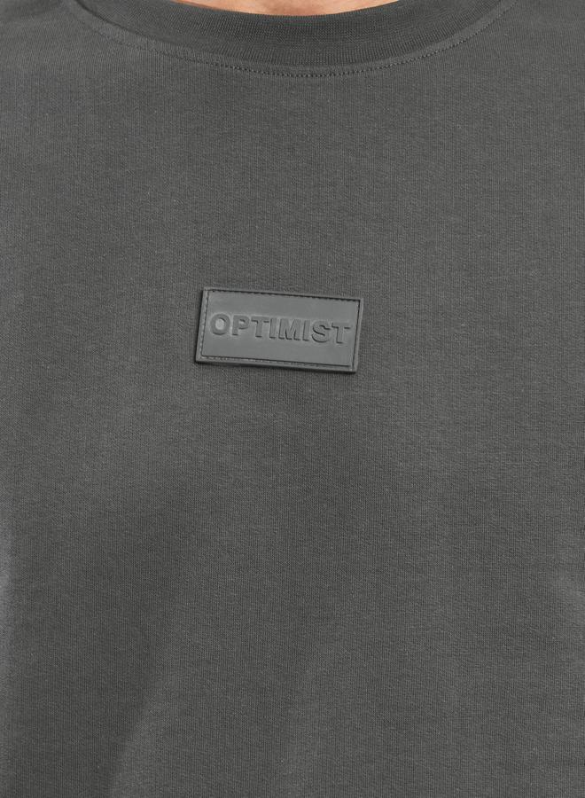 ستايلي تيشيرت تيري كبير الحجم بتفاصيل شعار سيليكون - Image 3