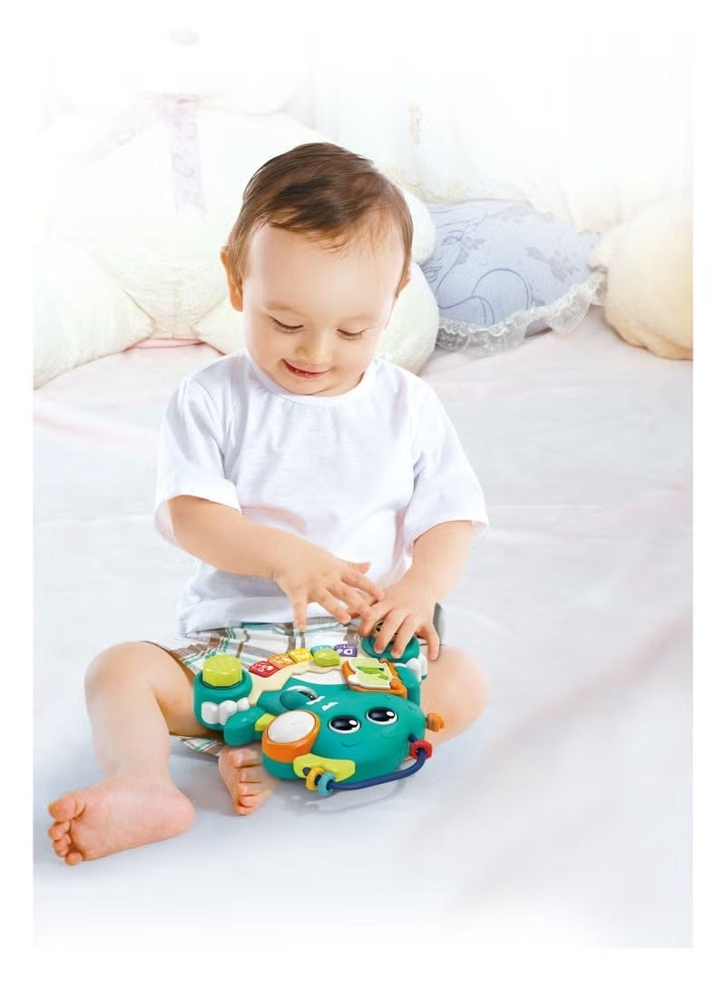 HOLA لعبة الديناصور التفاعلية هولا للتعلم للأطفال الصغار | دينو موسيقي وتعليمي 2 في 1 مع أضواء وأصوات | تطور المهارات الحركية للأطفال من 6 أشهر فما فوق - Image 3