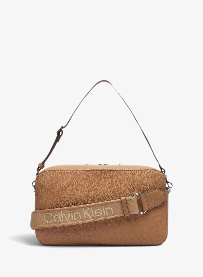 Calvin Klein Tannin Logo Strap Camera Bag for Women | Best Price UAE