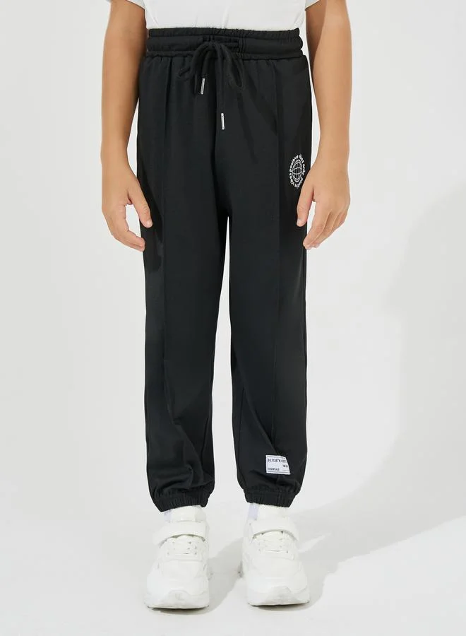 Styli Oversized Printed T-Shirt & Pintuck Detail Joggers Set