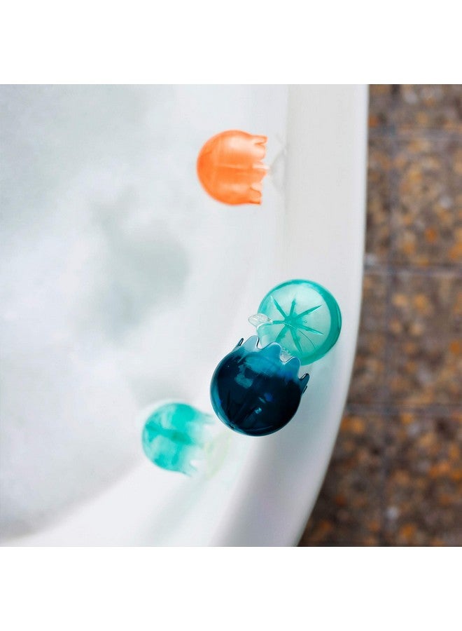 بون ألعاب استحمام على شكل أكواب شفط من Boon Jellies - ألعاب حسية للأطفال على شكل حوض استحمام - ألعاب شفط على شكل قنديل البحر لوقت الاستحمام - أزرق داكن/مرجاني - ألعاب استحمام للأطفال والرضع - 9 قطع - للأعمار من 12 شهرًا فما فوق - Image 4