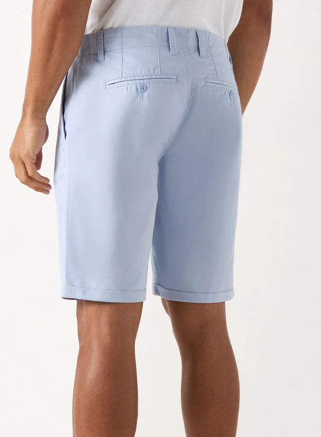 ايكونيك شورت سادة بقصة سليم وزر إغلاق من آيكونيك