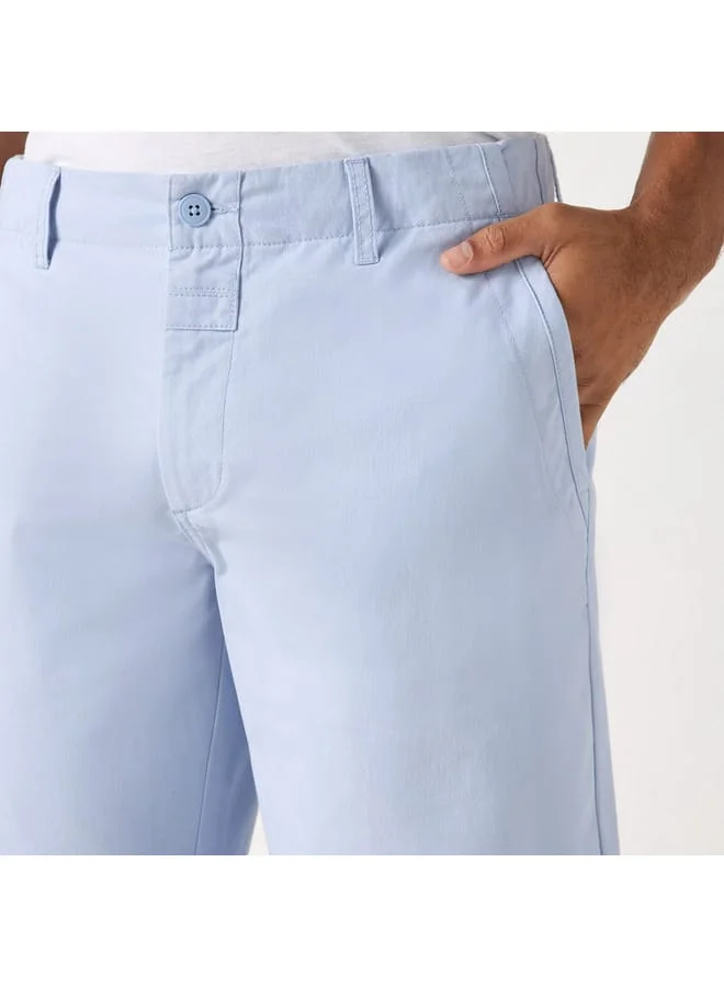 ايكونيك شورت سادة بقصة سليم وزر إغلاق من آيكونيك