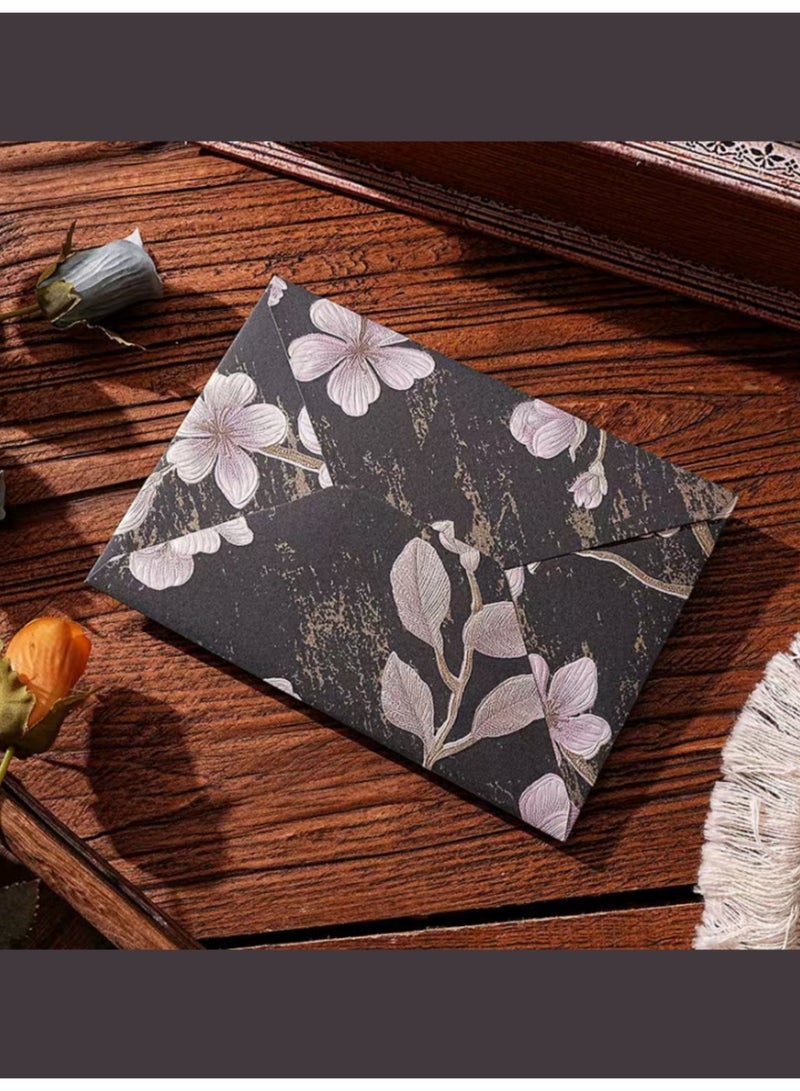 30pcs high-end vintage floral envelopes (black) is decorated with embossed gold foil. The floral pattern features a 3D textured design and is perfect for weddings, Christmas, anniversaries, birthdays, New Year's Day, Valentine's Day, and other occasions, as well as everyday use. Made of high-quality paper, they're suitable for everyone. (Due to paper cutting, the placement of the flowers may be random.) - Image 2