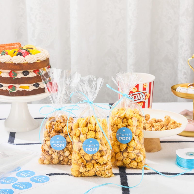 Menkxi 100 Pack Clear Popcorn Bags Bulk 4.92 x 10.83 Inch Cellophane Treat Plastic Party Favors Bags with She Is Going to Pop Label and Ribbon for Gift Wrapping, Food Storage, Baby Shower Decor(Blue) - Image 3