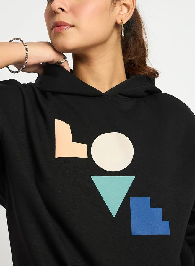 Femmella  Black Oversized Graphic Hoodie for Women | Best Price UAE