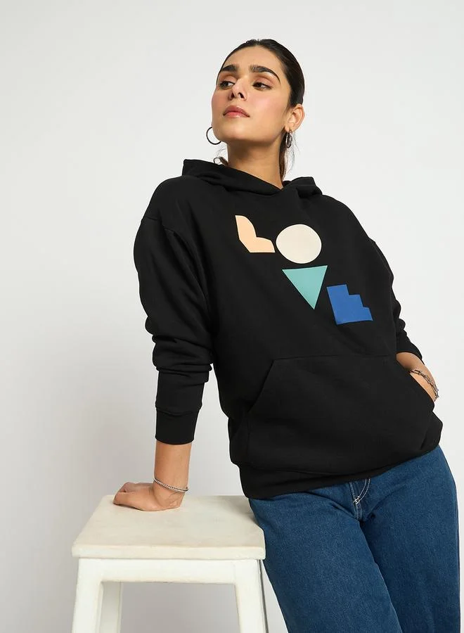Femmella  Black Oversized Graphic Hoodie for Women | Best Price UAE