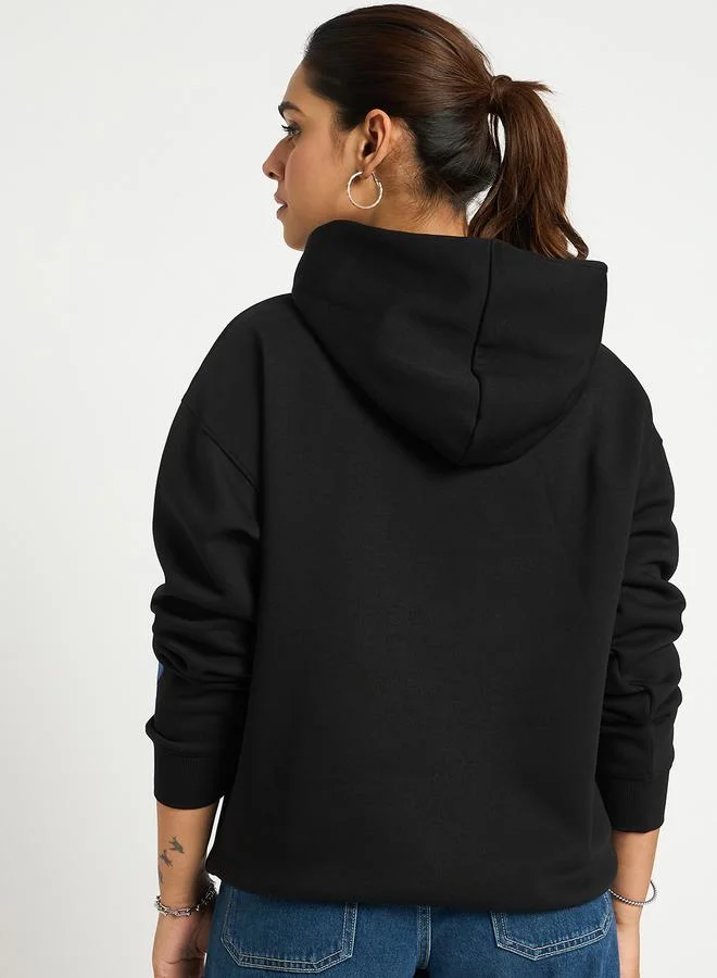 Femmella  Black Oversized Graphic Hoodie for Women | Best Price UAE