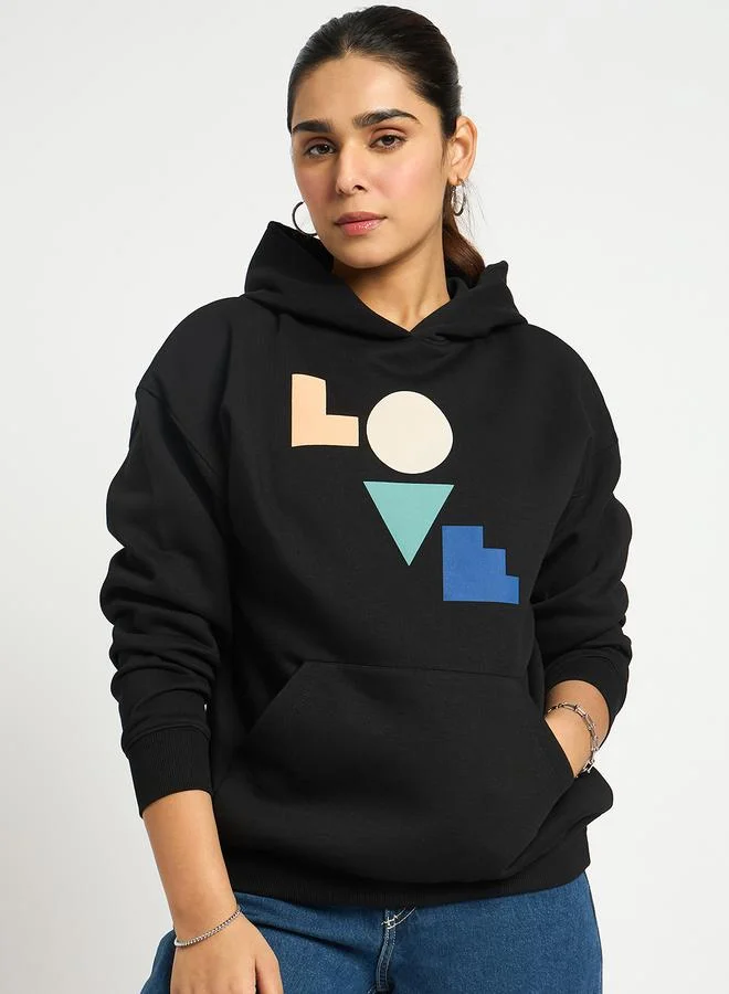Femmella  Black Oversized Graphic Hoodie for Women | Best Price UAE