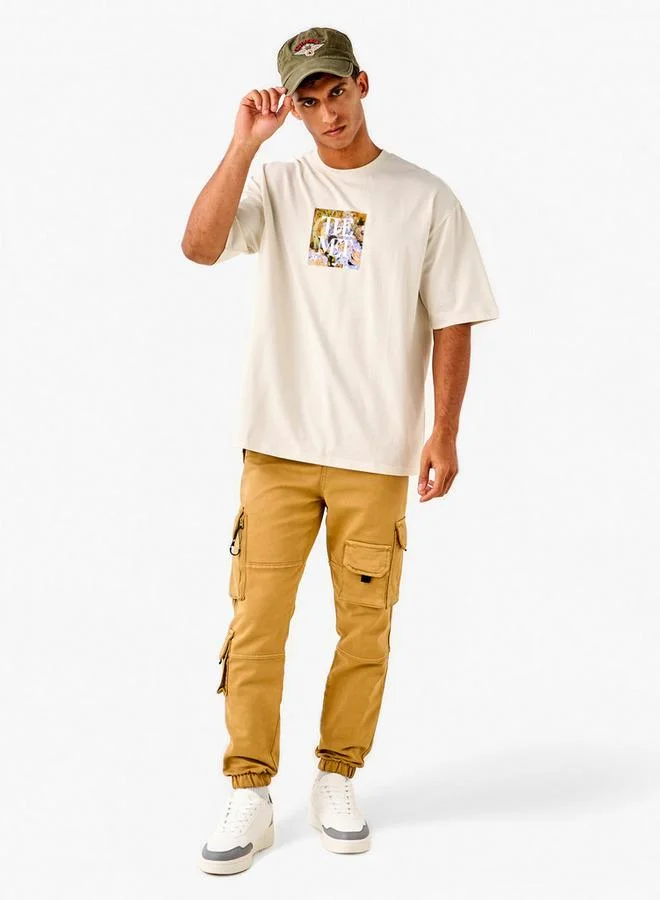 اس بي كاركترز تيشيرت بياقة دائرية وطبعات برسومات وأكمام قصيرة