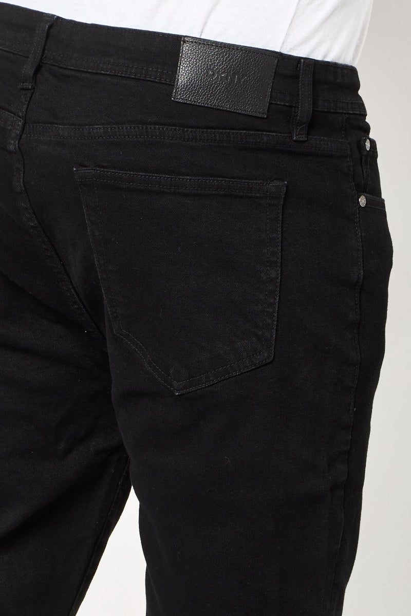 DKNY Men Skinny Fit Solid Stretchable Jeans, Black - Image 3