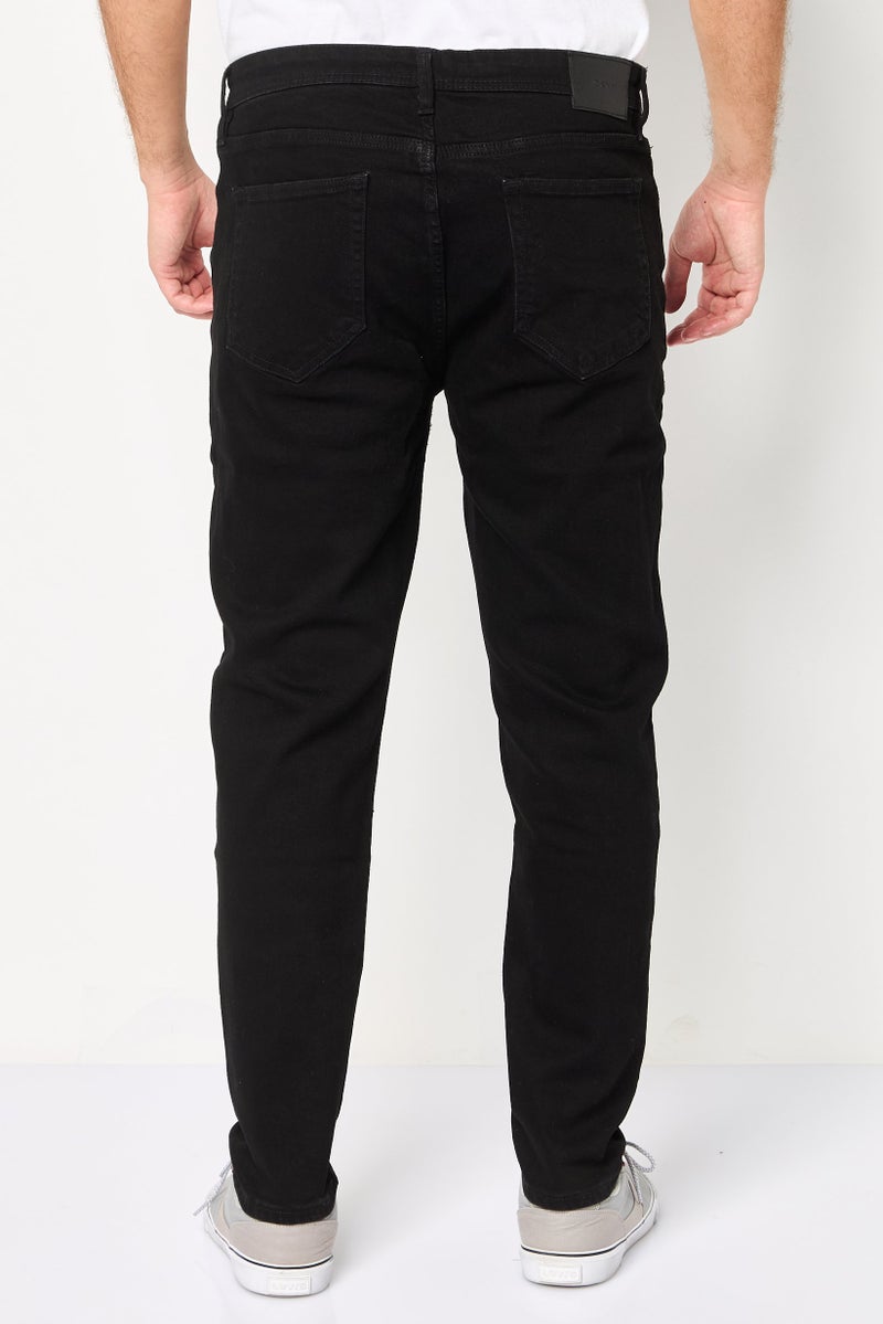 DKNY Men Skinny Fit Solid Stretchable Jeans, Black - Image 4