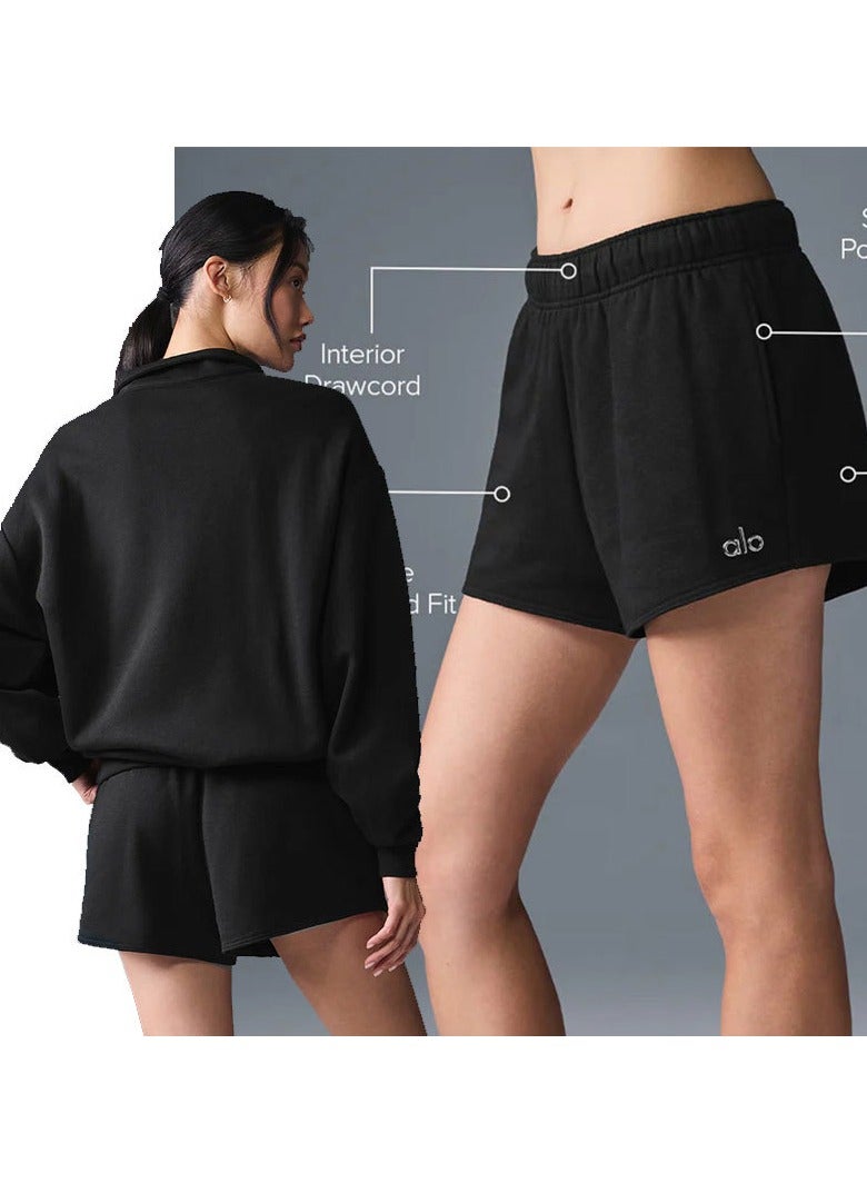 's zippered top and loose shorts suit