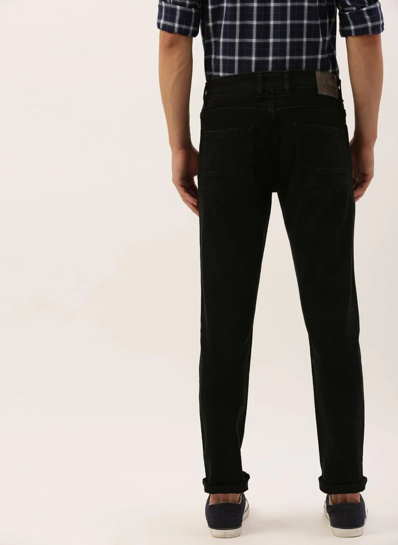 ذا انديان كراج كو Men Slim Fit Solid Mid-Rise Jeans