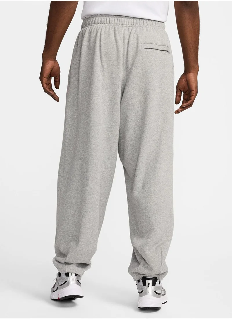 Nike Club Fitted Oversized Sweatpants