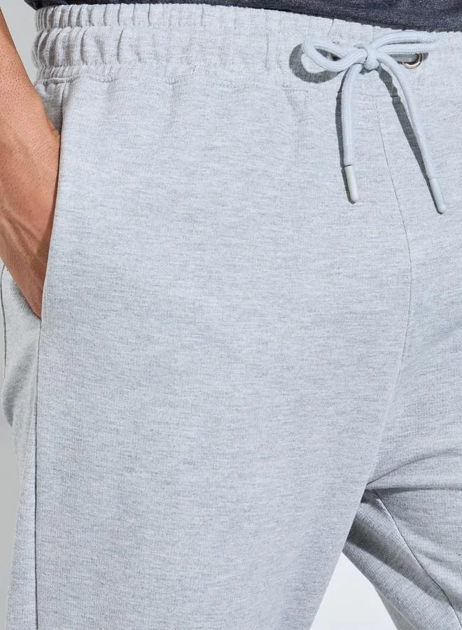 Styli  Grey Solid Pocket Details Straight Fit Sweatpants for Men | Best Price UAE