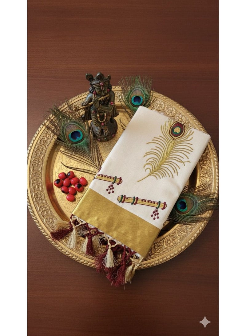 A.M traditional Kerala Kasavu saree. The saree is off-white or cream-colored with significant peacock feather motifs - Image 2