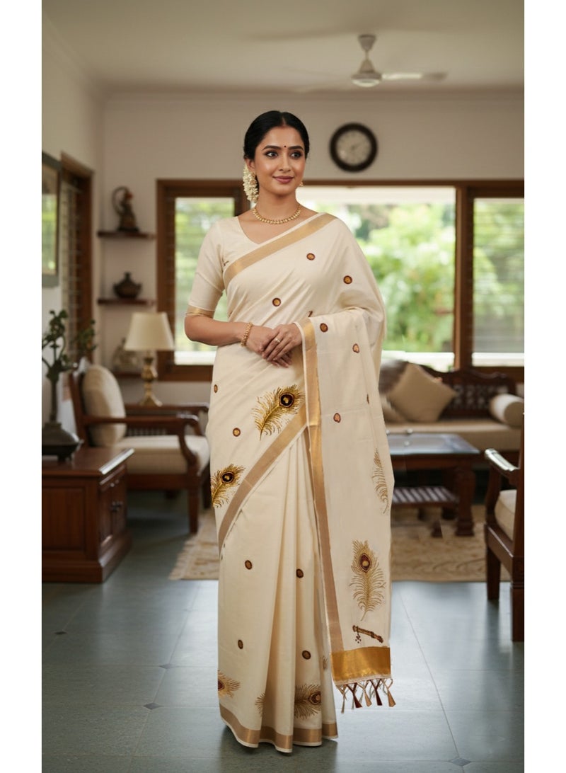 A.M traditional Kerala Kasavu saree. The saree is off-white or cream-colored with significant peacock feather motifs - Image 3