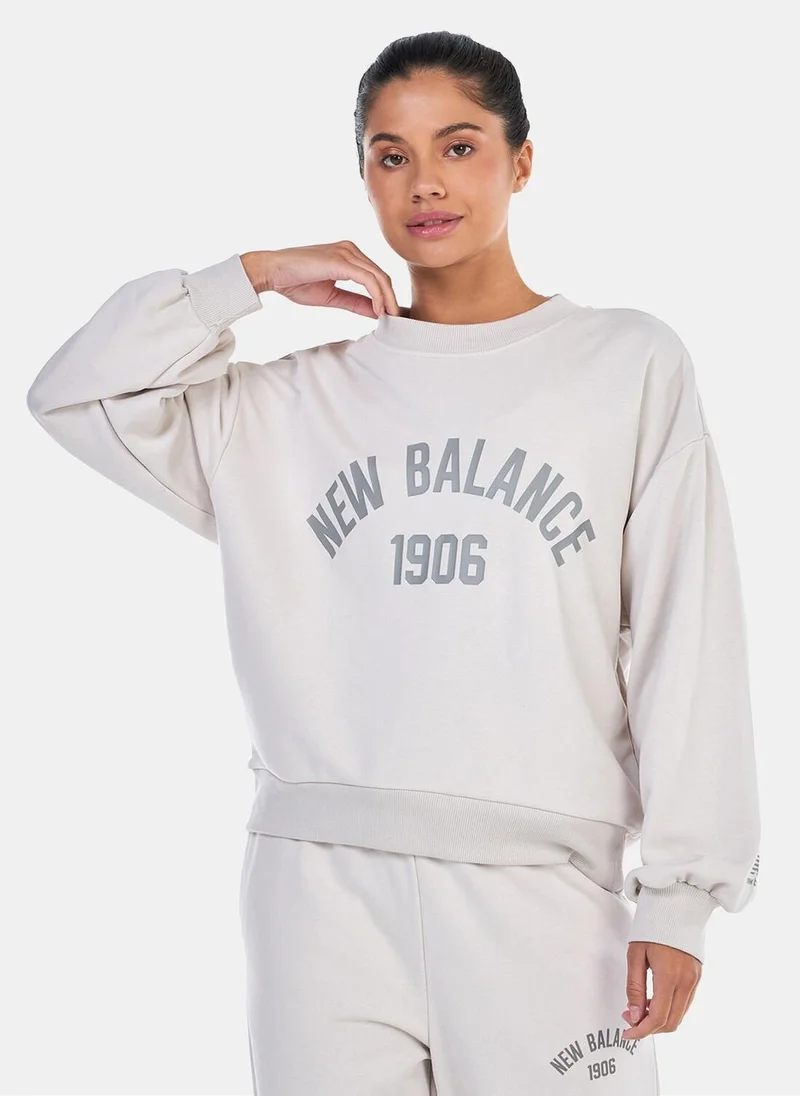 New Balance Women's Essentials Varsity Fleece Crew Sweatshirt