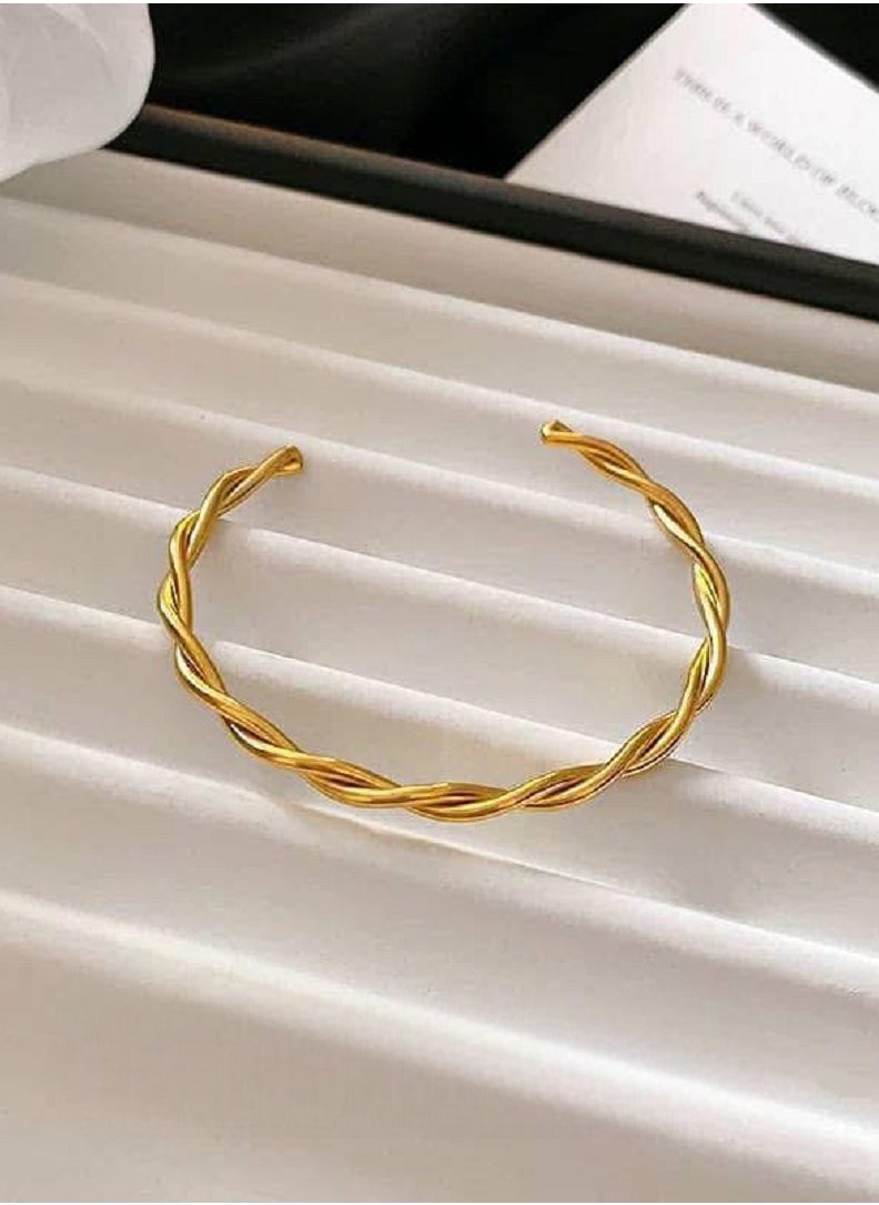 Ward Women's Bracelet Twisted Without Clasp in Gold Color, Made of Stainless Steel  - Image 1